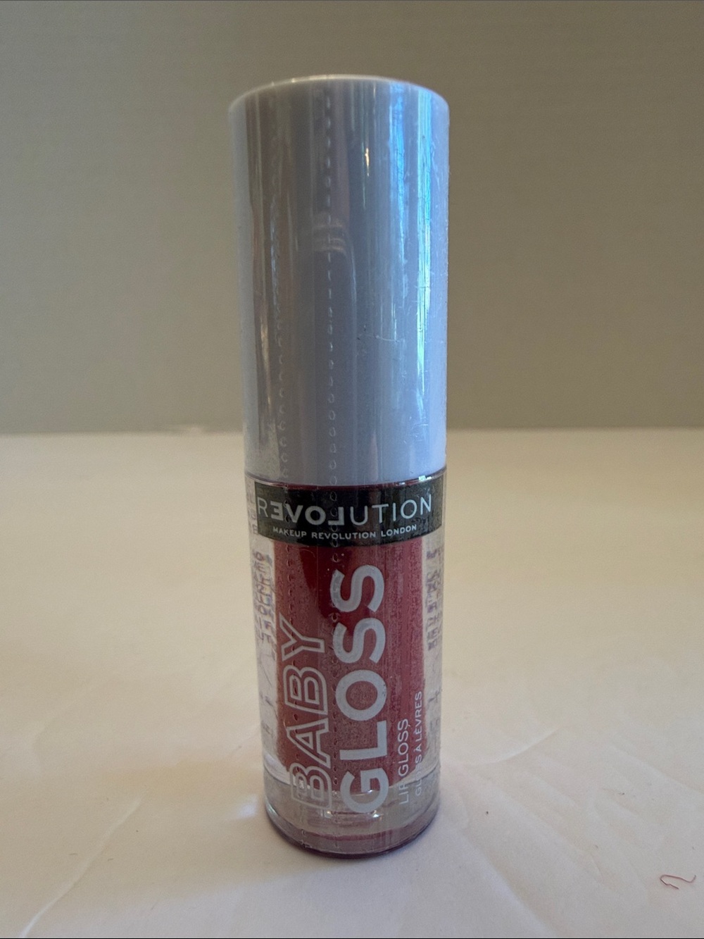 💕5/25💕Revolution Baby Gloss Lip Gloss — Babe
